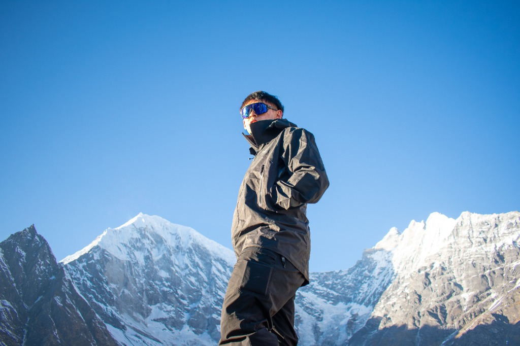 Jeriel Chan with mountain backdrop